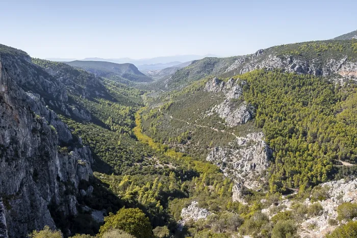 Framed Print : View into a valley with rock walls in the mountains