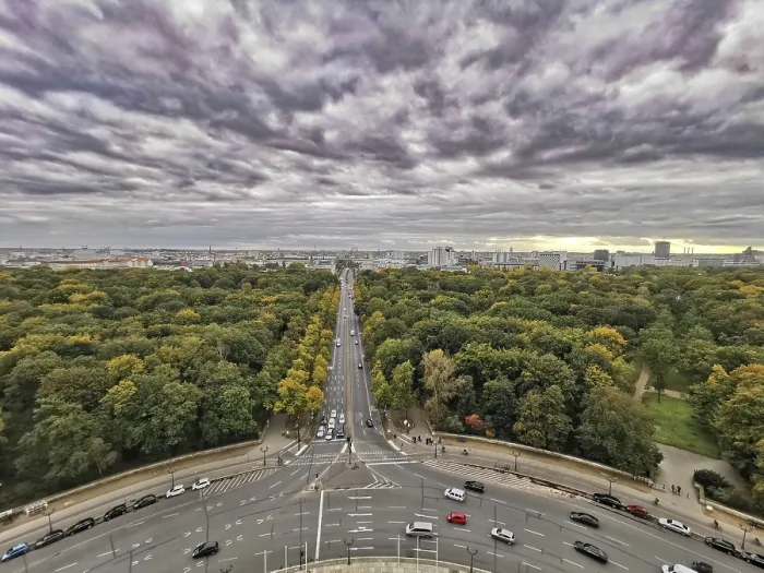 Framed Print : View from Victory Column, A dramatic cloudy sky over Berlin with a long avenue flanked by autumn trees Framed Print : View from Victory Column, A dramatic cloudy sky over Berlin with a long avenue flanked by autumn trees