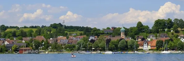 Framed Print : View of the village with St. Nicholas Church
