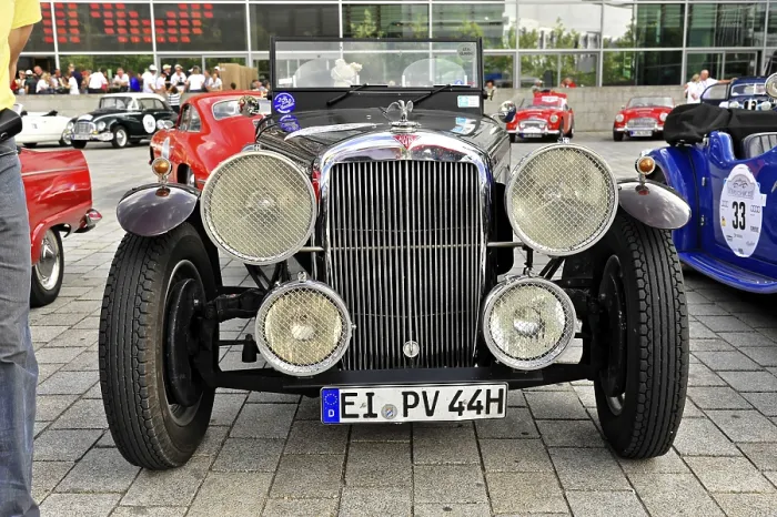 Framed Print : Front view of a vintage car with large headlights and stylish bumper Framed Print : Front view of a vintage car with large headlights and stylish bumper