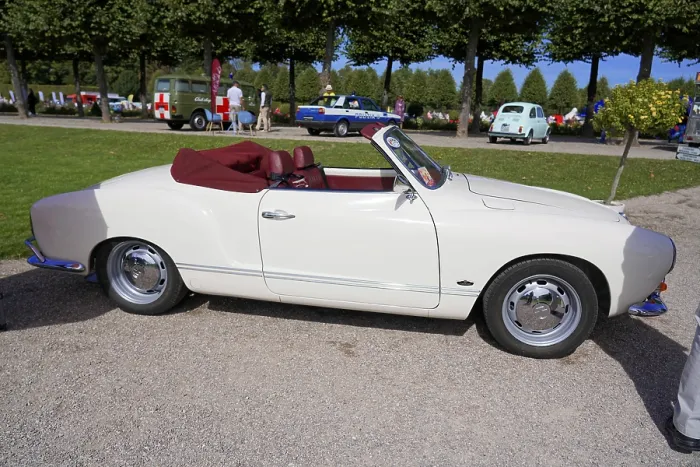 Framed Print : Side view of a white convertible at a motor show Framed Print : Side view of a white convertible at a motor show
