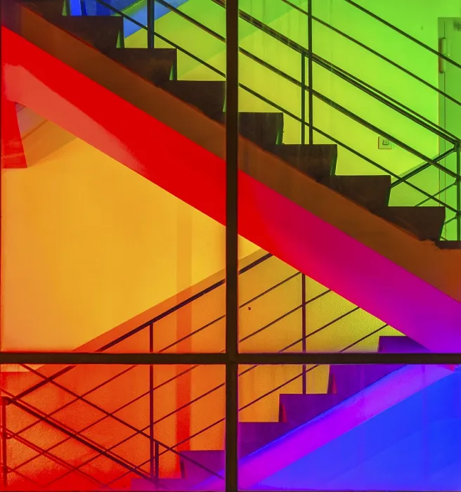 Framed Print : View through the windows of a brightly lit staircase