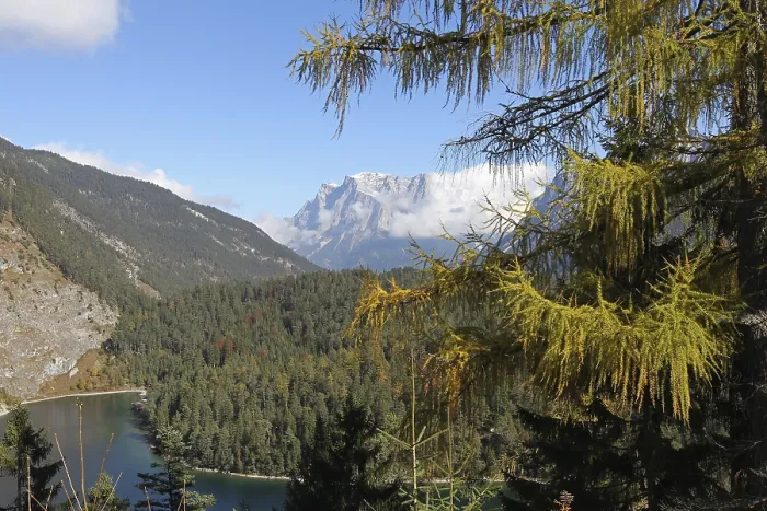 Framed Print : View of the Zugspitze massif with Blindsee lake in autumn