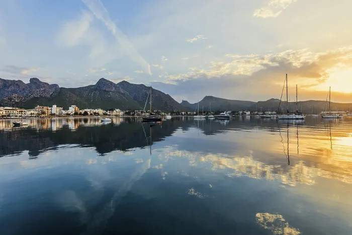 Framed Print : Village by the sea and mountains at sunrise