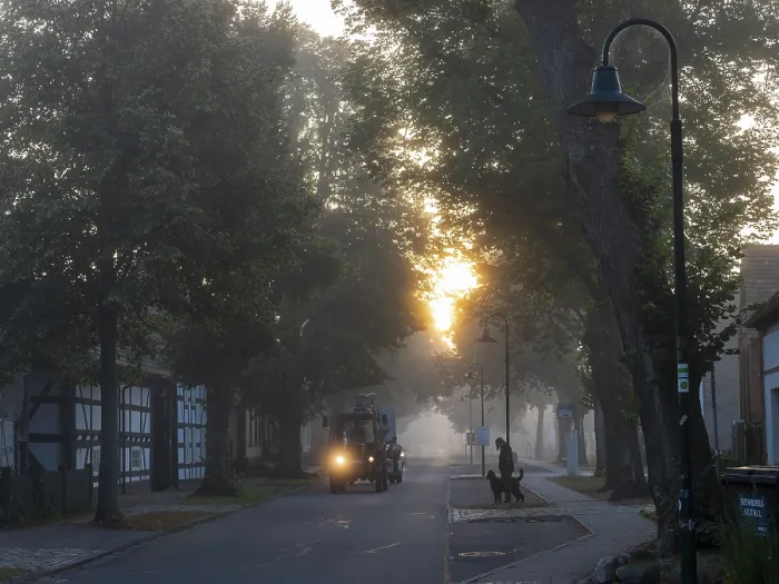Framed Print : Village street in the morning with tractor Framed Print : Village street in the morning with tractor