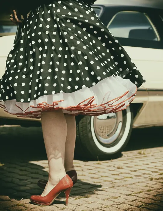 Framed Print : Vintage American road cruiser Buick with woman and petticoat