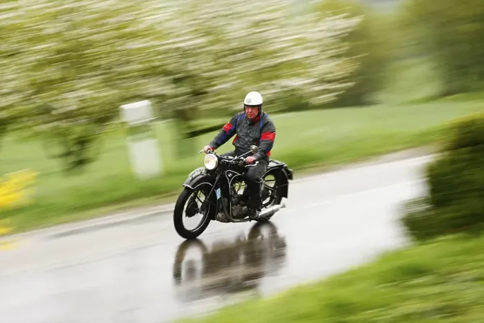 Framed Print : Vintage BMW motorcycle in the rain
