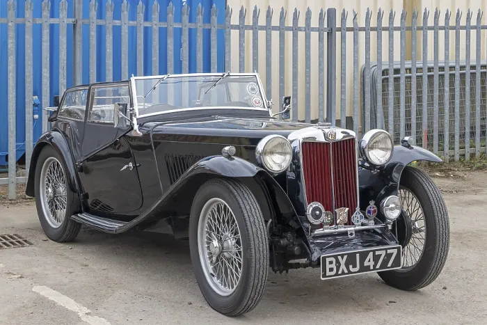 Framed Print : Vintage car in the car park, railway station