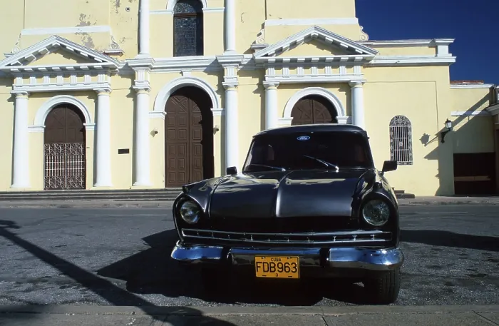 Framed Print : Vintage car, Ford in front of cathedral de la Purisima Concepcion