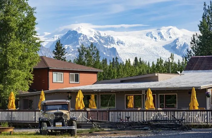 Framed Print : Vintage car and historic building in front of mountain landscape with Kennicott Glacier