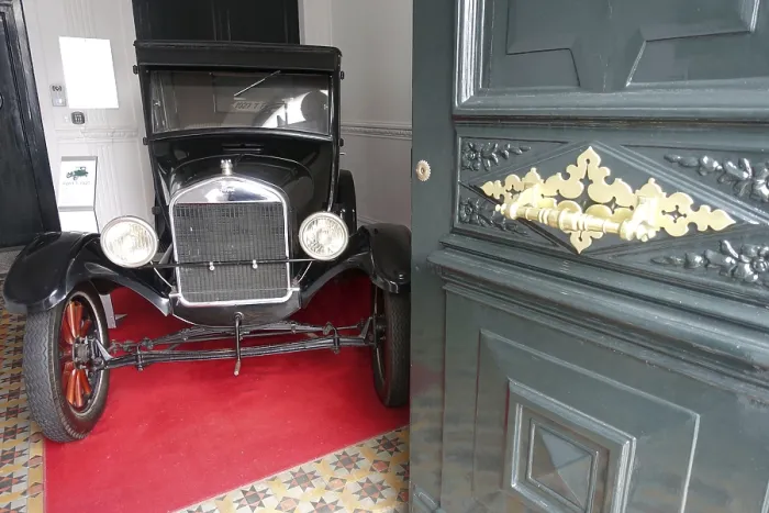 Framed Print : Vintage car in a house entrance - Ford Model T