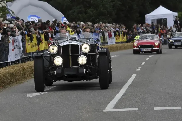 Framed Print : A vintage car with illuminated headlights at a classic car race Framed Print : A vintage car with illuminated headlights at a classic car race