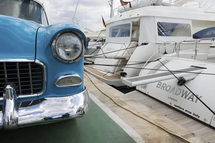Framed Print : Vintage Chevrolet in front of a luxury yacht called Broadway Framed Print : Vintage Chevrolet in front of a luxury yacht called Broadway