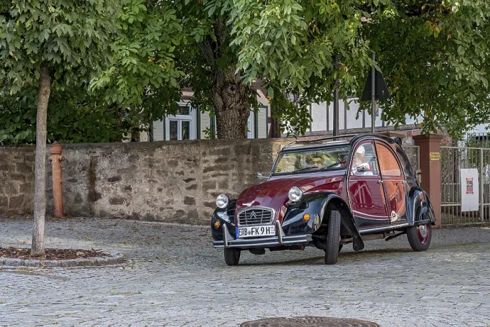 Framed Print : Vintage Citroen 2CV in motion, ugly duck