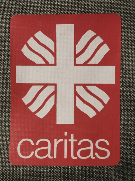 Framed Print : Vintage logo and lettering of the Caritas brand