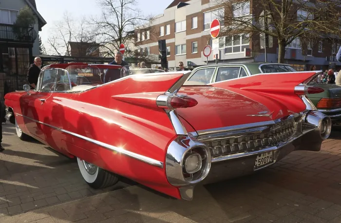 Framed Print : Vintage road cruiser cabriolet Cadillac series 62 convertible from 1959 in red