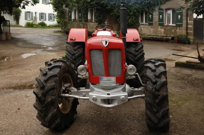 Framed Print : Vintage Schlueter tractor on a farm