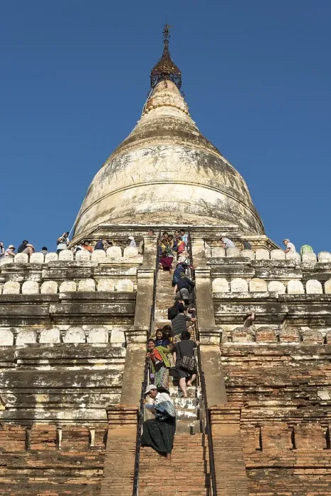 Framed Print : Visitors climb steep steps of Shwesandaw Pagoda