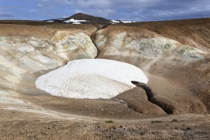 Framed Print : Volcanic landscape, lava field with snow field at Krafla volcano