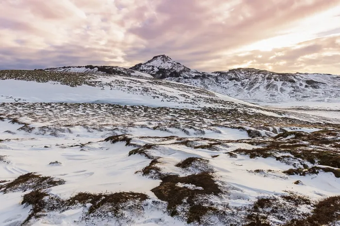 Framed Print : Volcanic landscape with snow, evening mood