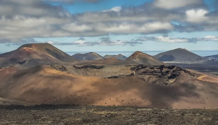 Framed Print : Volcanic landscape of the Timanfaya National Park (also called The Montanas del Fuego or Mountains of Fire)