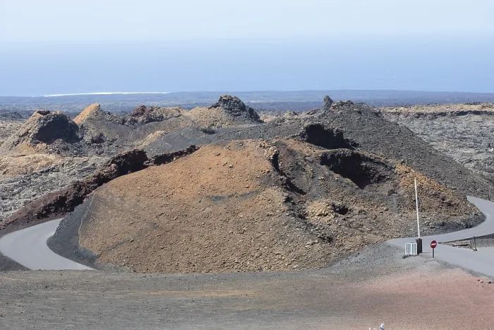 Framed Print : Volcanic landscape with visitor centre in Timanfaya National Park