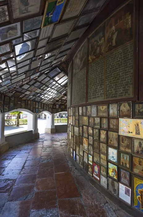 Framed Print : Votive plaques in the walkway around the Chapel of Grace