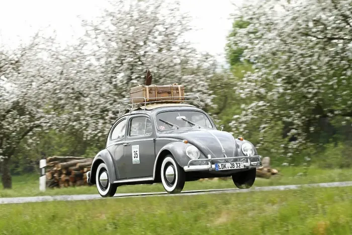 Framed Print : VW Beetle with skis and luggage on the roof Framed Print : VW Beetle with skis and luggage on the roof