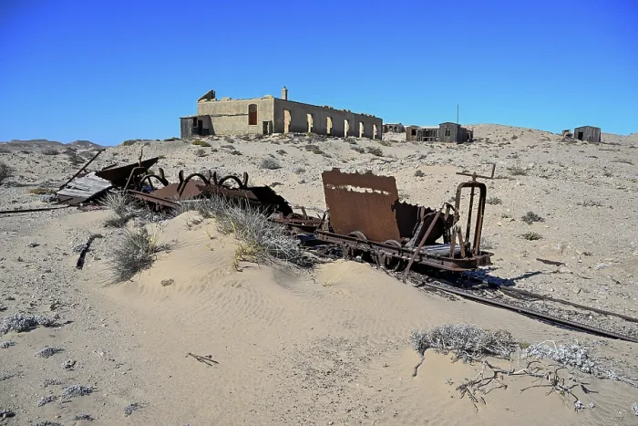 Framed Print : Wagon of an old narrow-gauge railway in the desert sand Framed Print : Wagon of an old narrow-gauge railway in the desert sand