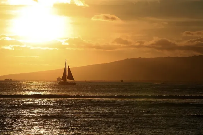 Framed Print : Waikiki with a sailboat in front of the mountains at sunset Framed Print : Waikiki with a sailboat in front of the mountains at sunset