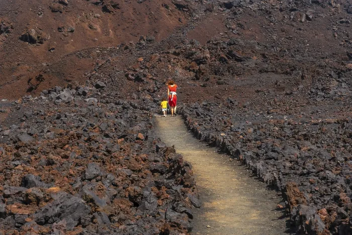 Framed Print : Walking through the beautiful red volcano in the town of Tamaduste on the coast of the island of El Hierro