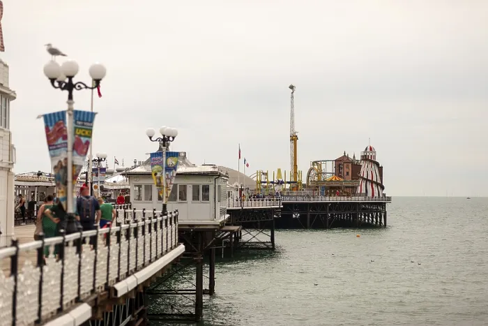 Framed Print : Walkway along Brighton Pier with amusement structures Framed Print : Walkway along Brighton Pier with amusement structures