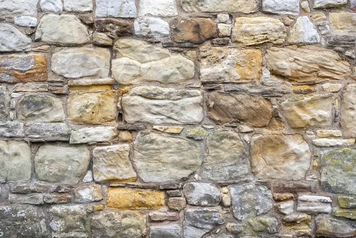 Framed Print : Wall stones made of different types of stone Framed Print : Wall stones made of different types of stone