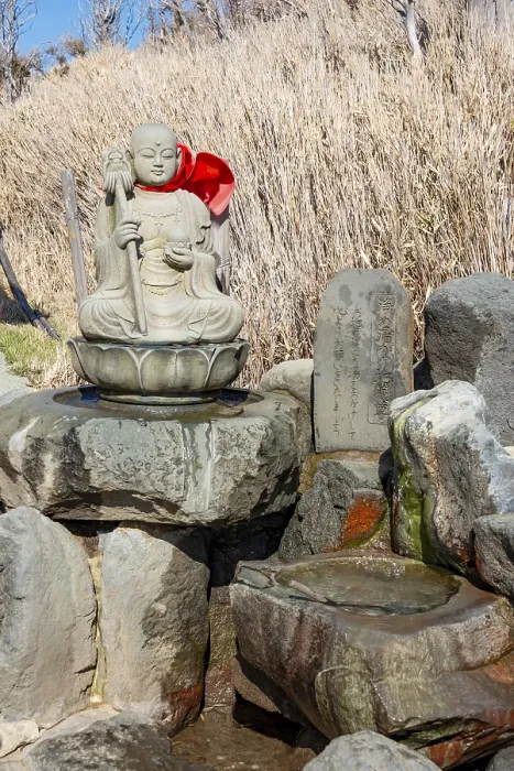 Framed Print : Warm spring water and Buddha statue