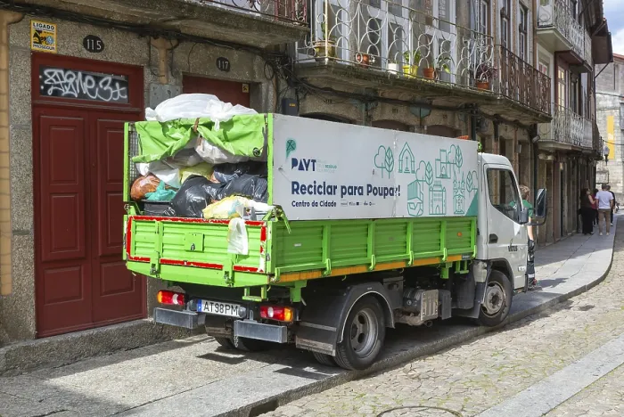 Framed Print : Waste refuse collection service in city centre street