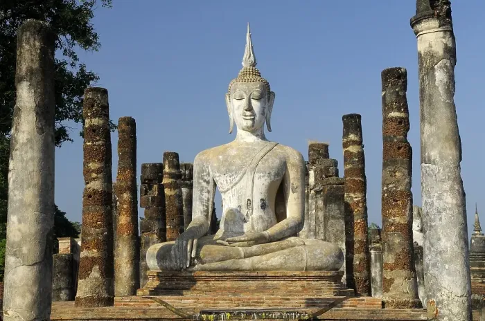 Framed Print : Wat Mahathat Temple and a Buddha statue in the temple of the Unesco World Heritage Site Framed Print : Wat Mahathat Temple and a Buddha statue in the temple of the Unesco World Heritage Site