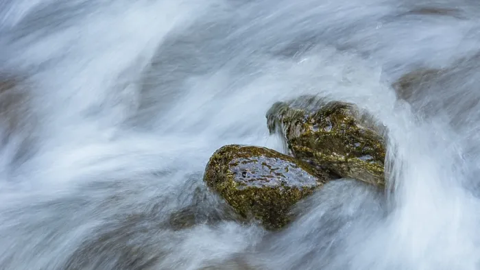 Framed Print : Water laps rocks in Gartel waterfall in Hohe Tauern National Park