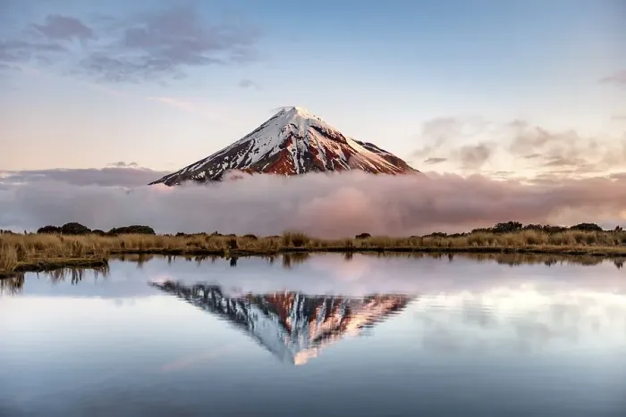 Framed Print : Water reflection in Pouakai Tarn Mountain Lake at sunset Framed Print : Water reflection in Pouakai Tarn Mountain Lake at sunset