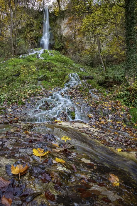 Framed Print : Waterfall in autumn in the middle of the forest