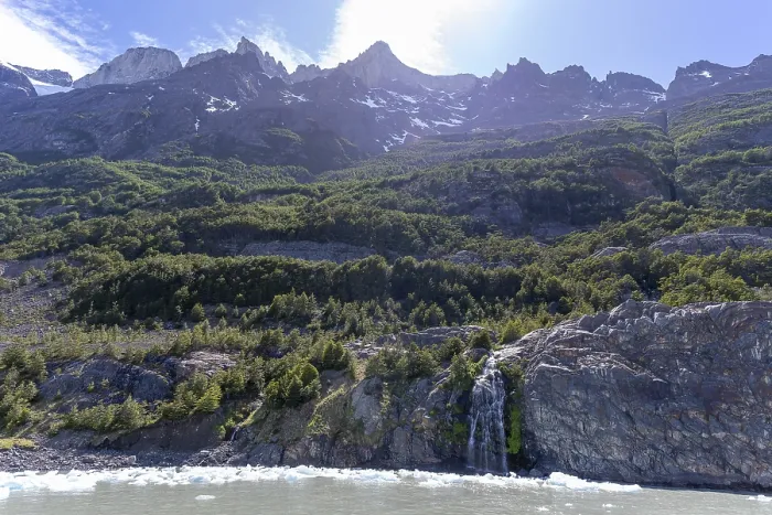 Framed Print : Waterfall, floating ice, mountain range