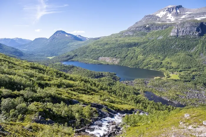 Framed Print : Waterfall flows into the Innerdalen high valley Framed Print : Waterfall flows into the Innerdalen high valley