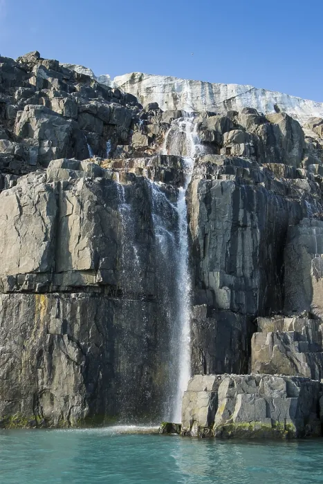 Framed Print : Waterfall in a glacier on Alkefjellet