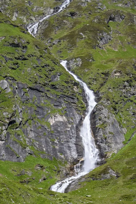 Framed Print : Waterfall on a green mountainside