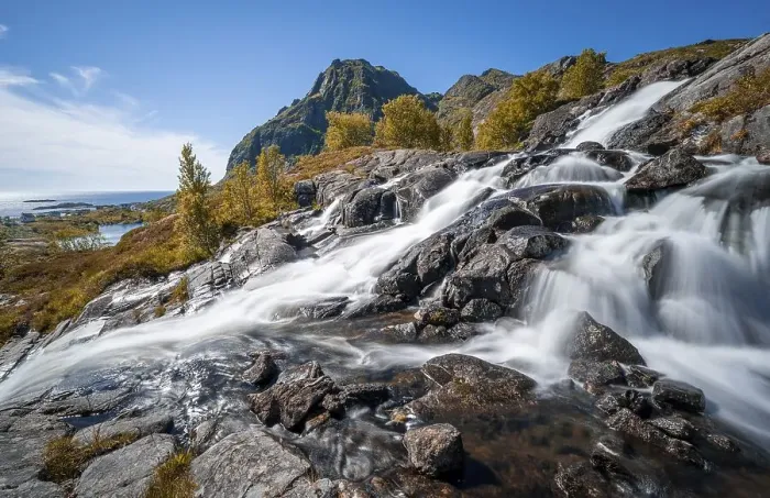 Framed Print : Waterfall near Sorvagen, mountain landscape with river