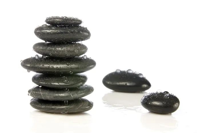 Framed Print : Wet zen stones isolated over a white background