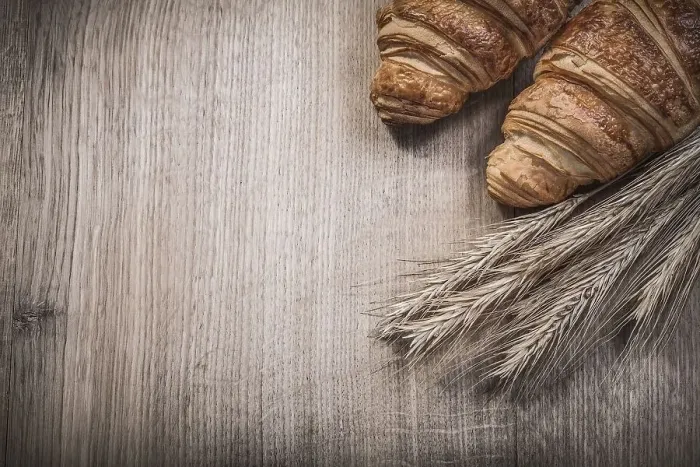 Framed Print : Wheat rye ears croissants on wooden board Framed Print : Wheat rye ears croissants on wooden board