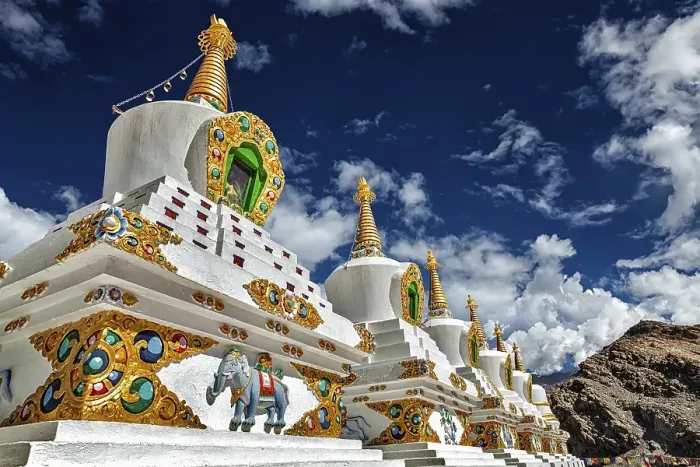 Framed Print : White chortens (Buddhist stupas) in Thiksey gompa