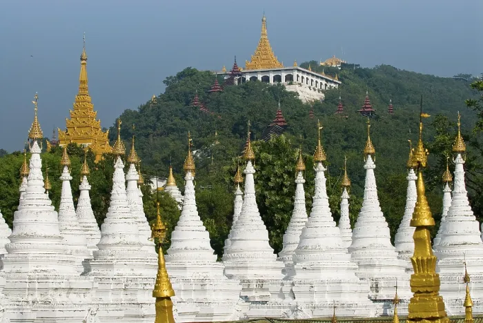 Framed Print : Many white, golden-tipped stupas forming several rows