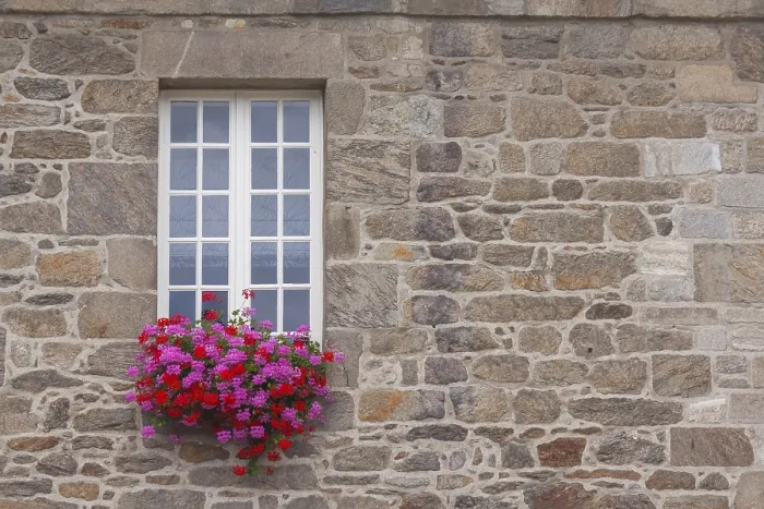 Framed Print : White mullioned window in a historic house