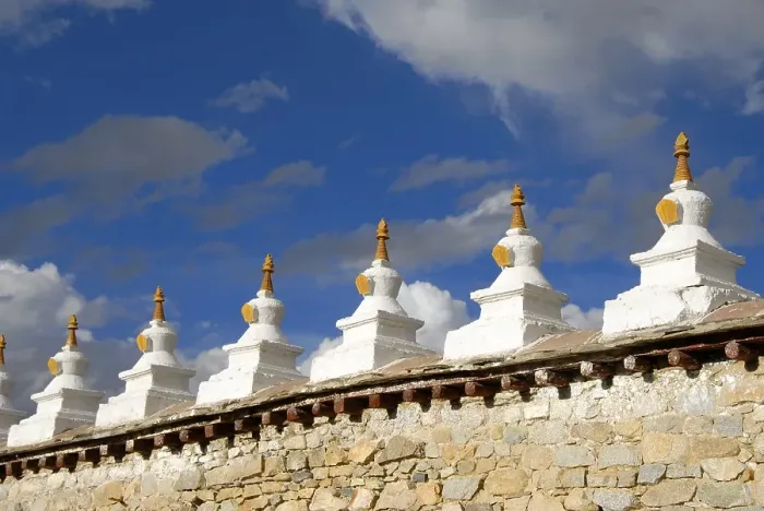 Framed Print : Many white small turrets choerten on a wall Samye Monastery Tibet China